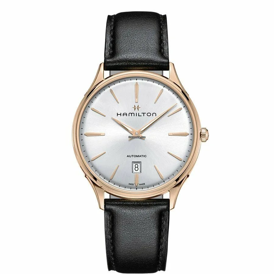 gold watch on leather strap