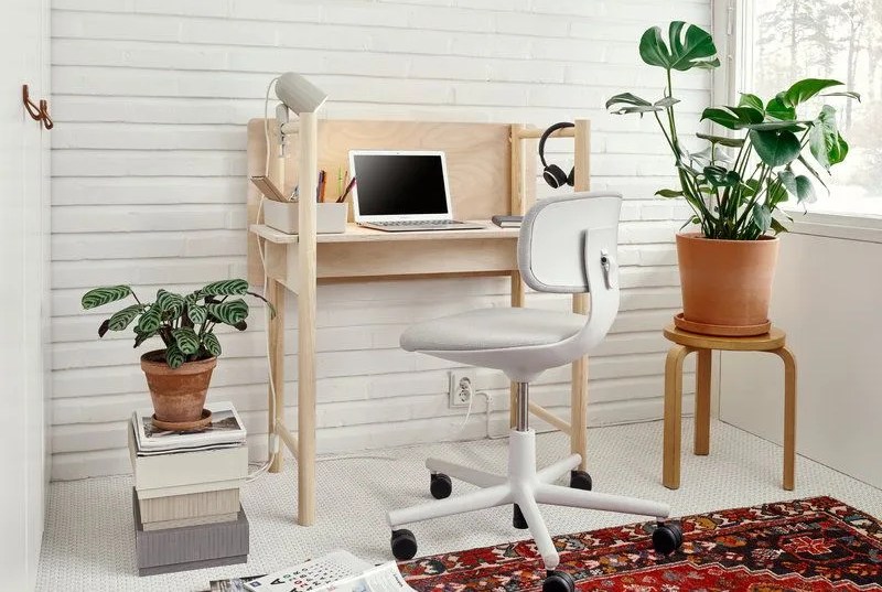 space setup with office chair and plants