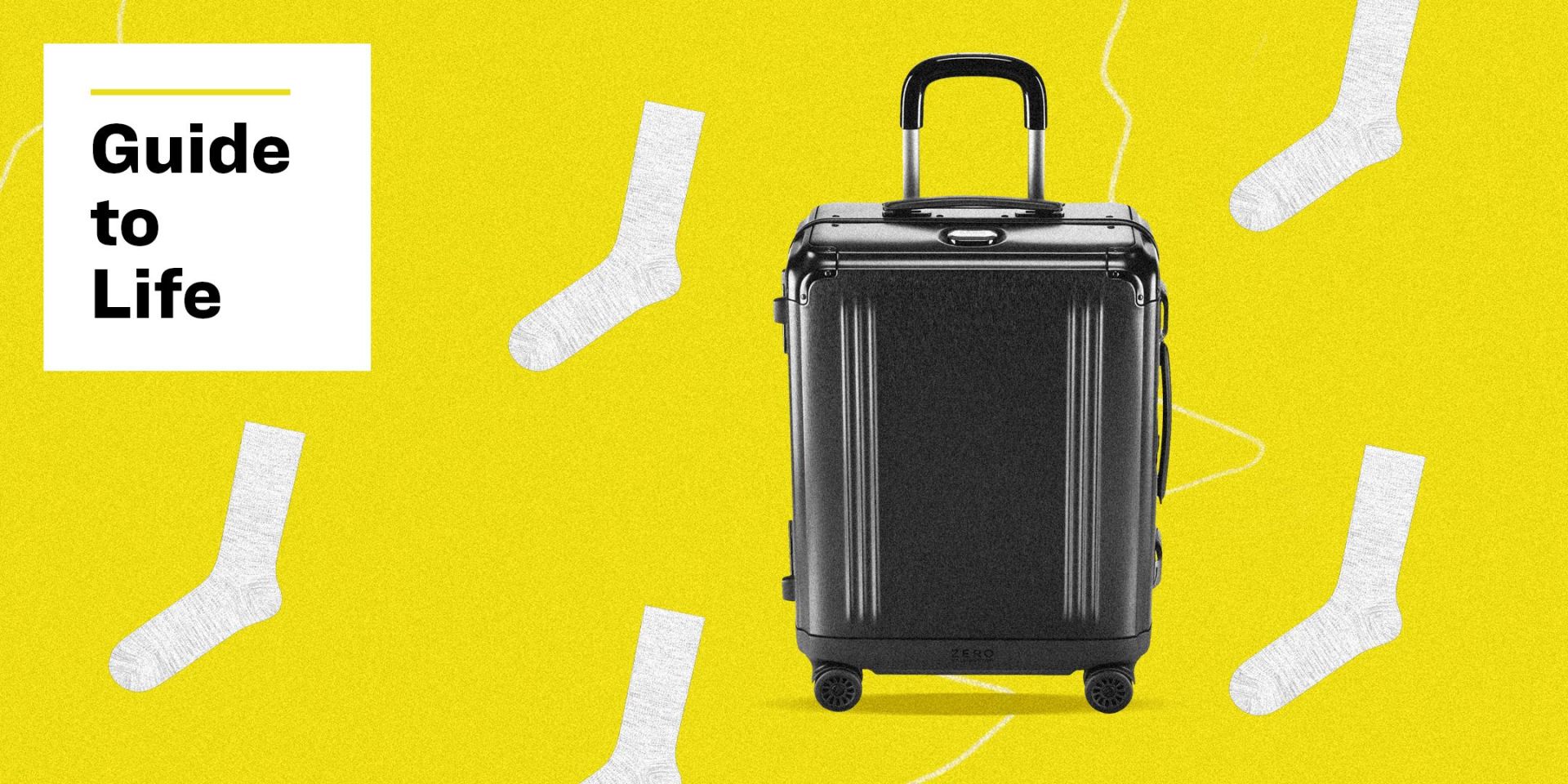 black rolling suitcase against yellow background