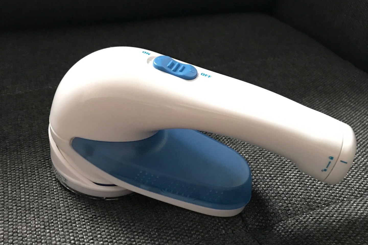 conair fabric shaver on fabric sofa