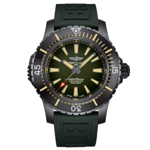 black dive watch with green dial