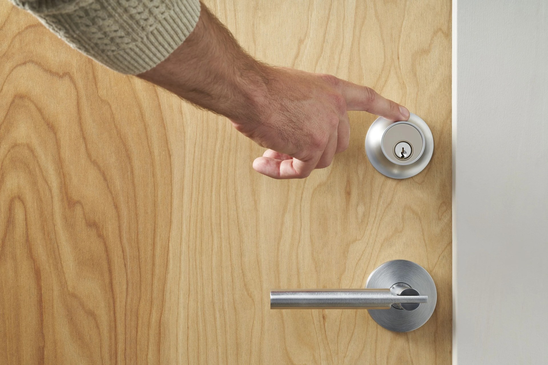 hand touching lock