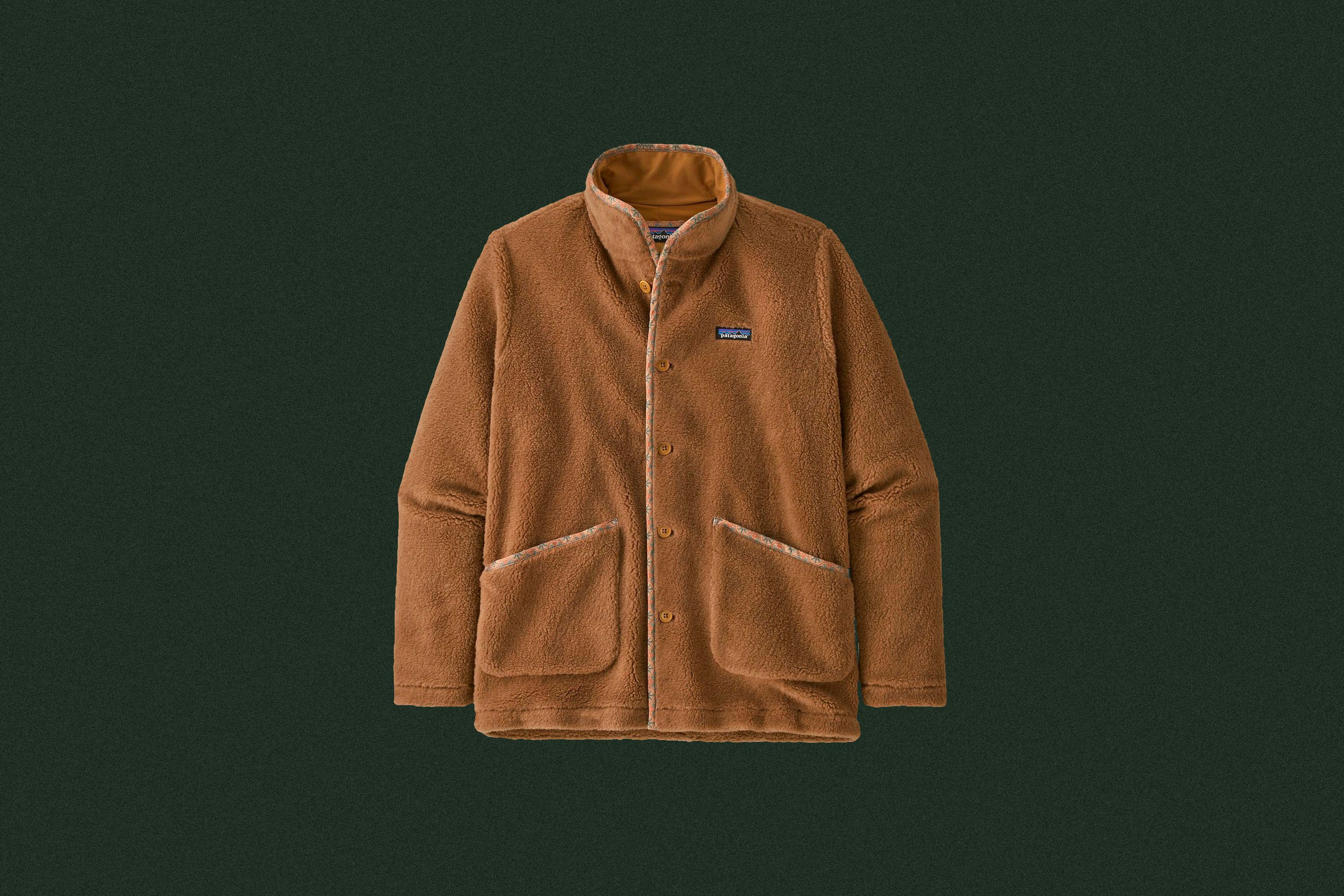 a light brown fleece coat with buttons