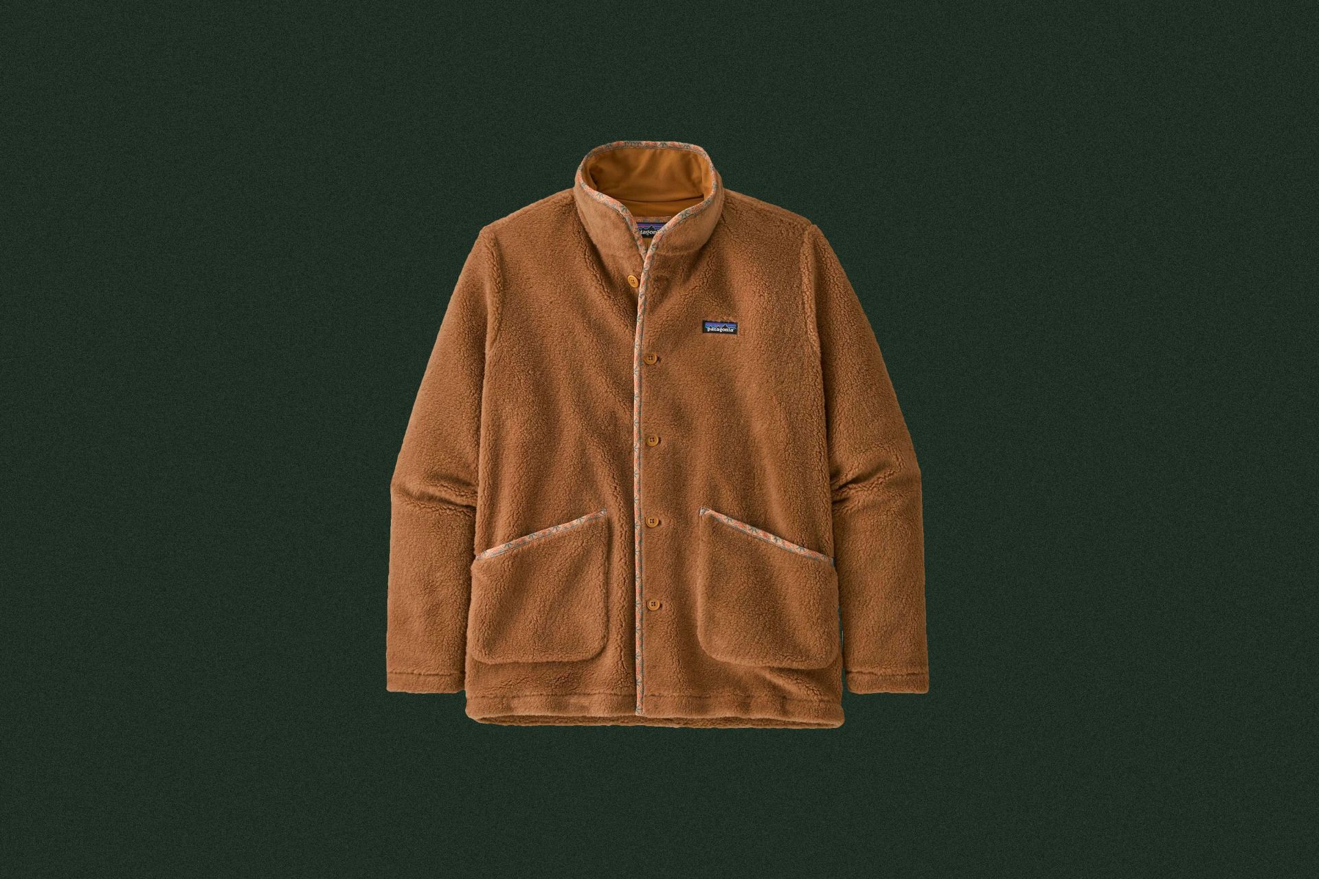 a light brown fleece coat with buttons