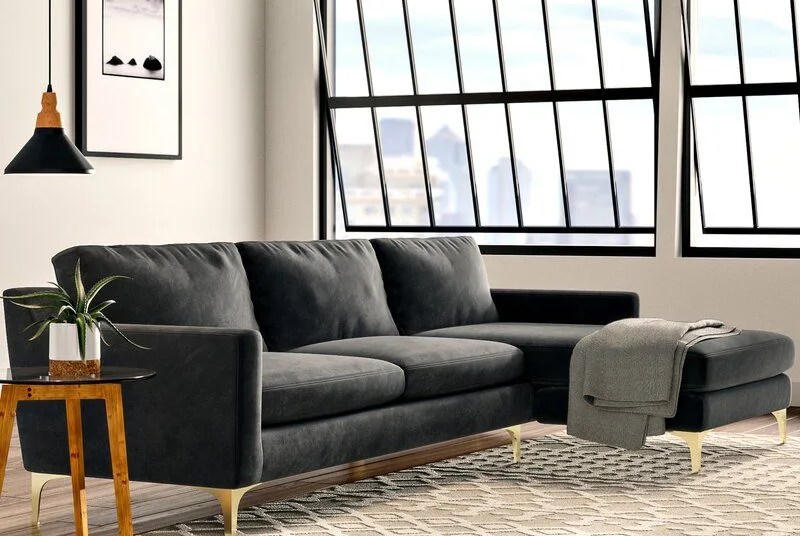 sofa, sidetable and ottoman in a room