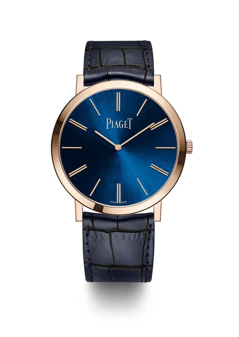gold watch with blue dial
