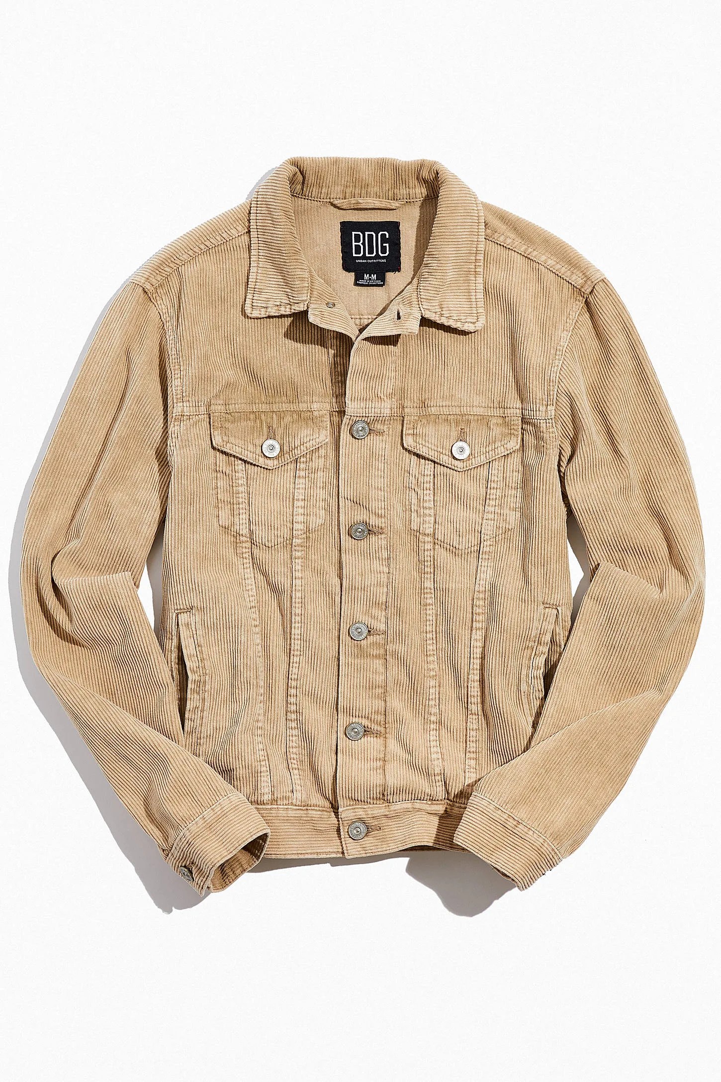 A tan corduroy trucker jacket