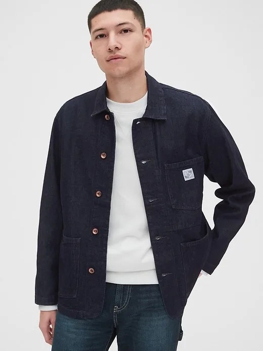 A model wearing a denim chore coat