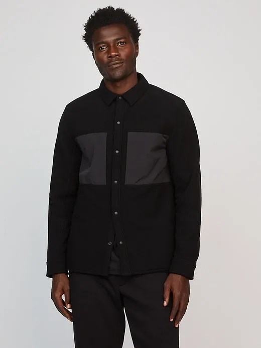 A model wearing a fleece shirt