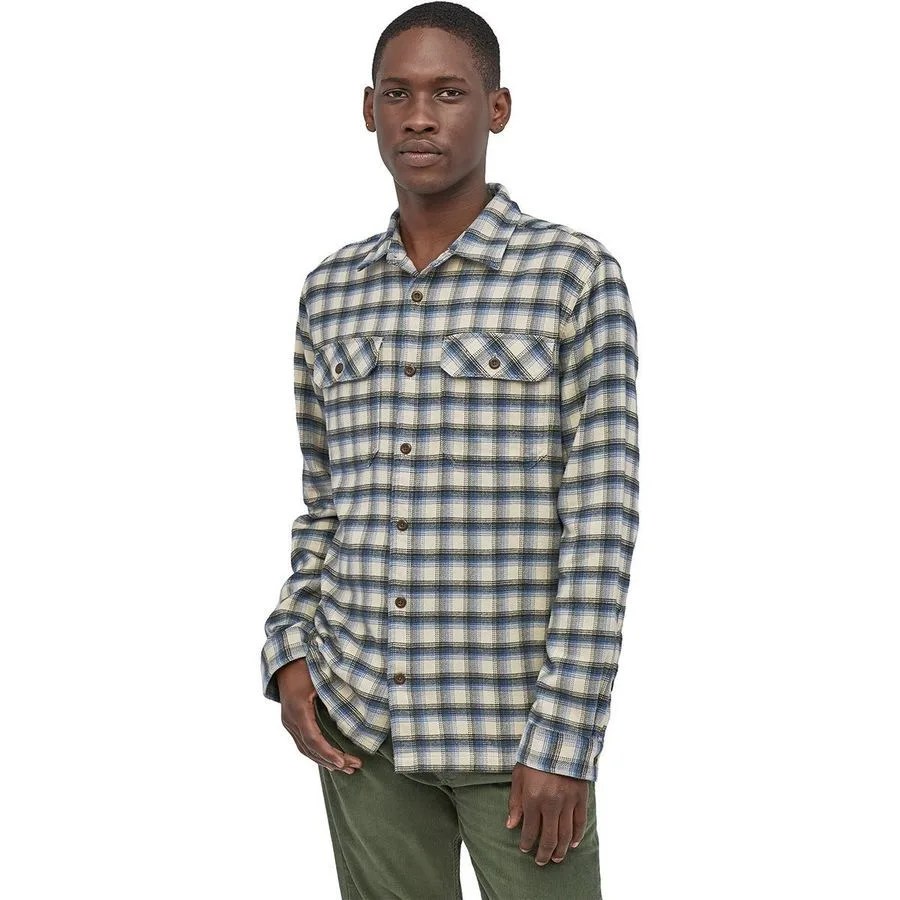 A model wearing a flannel shirt
