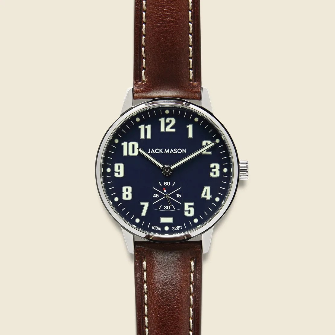 blue watch on brown strap