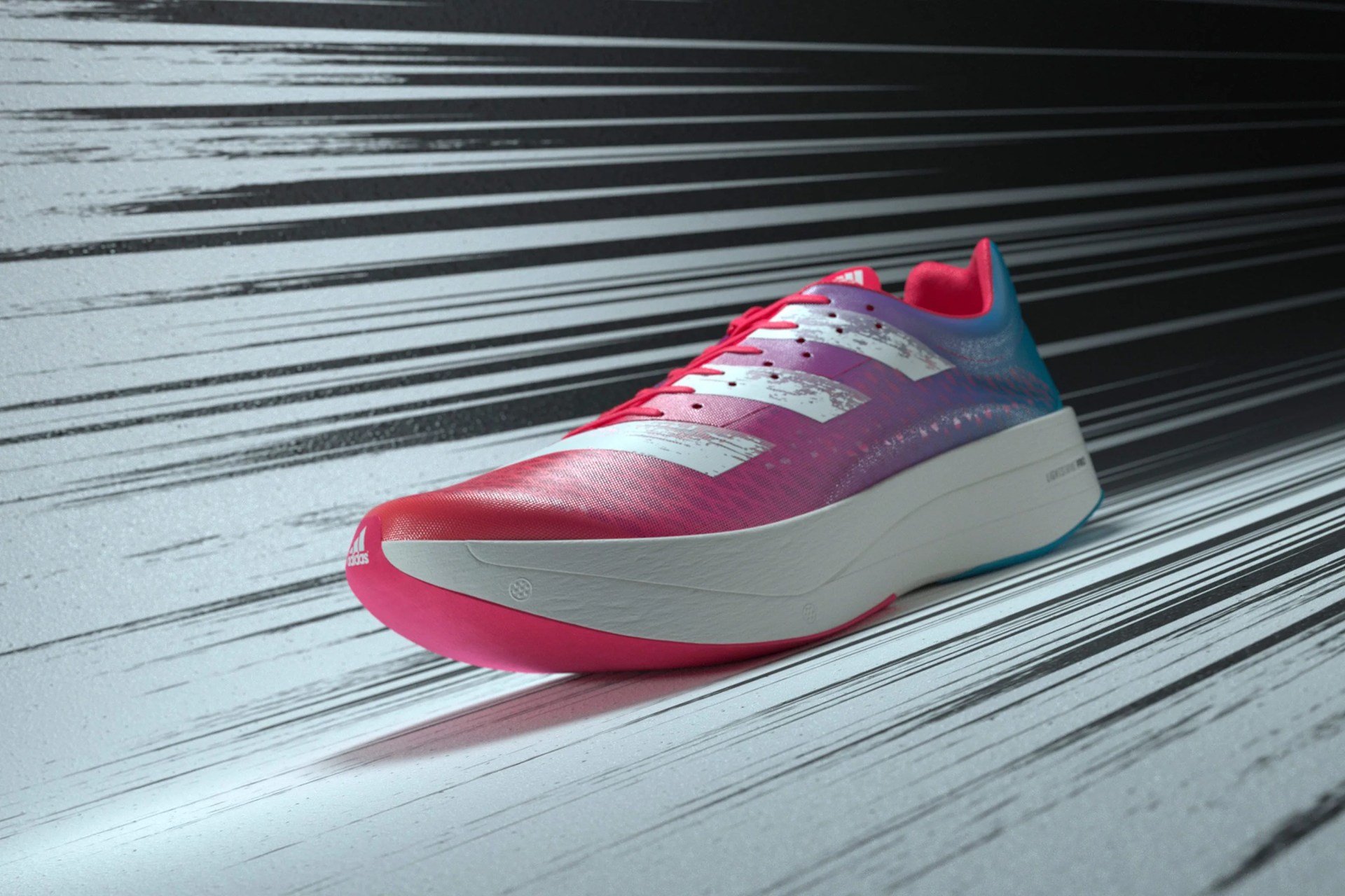 a pink and blue running shoe with white accents