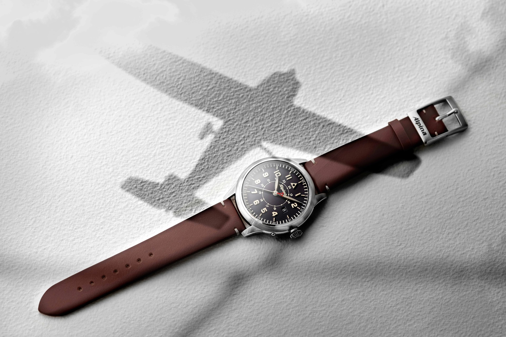 pilot watch with airplane shadow