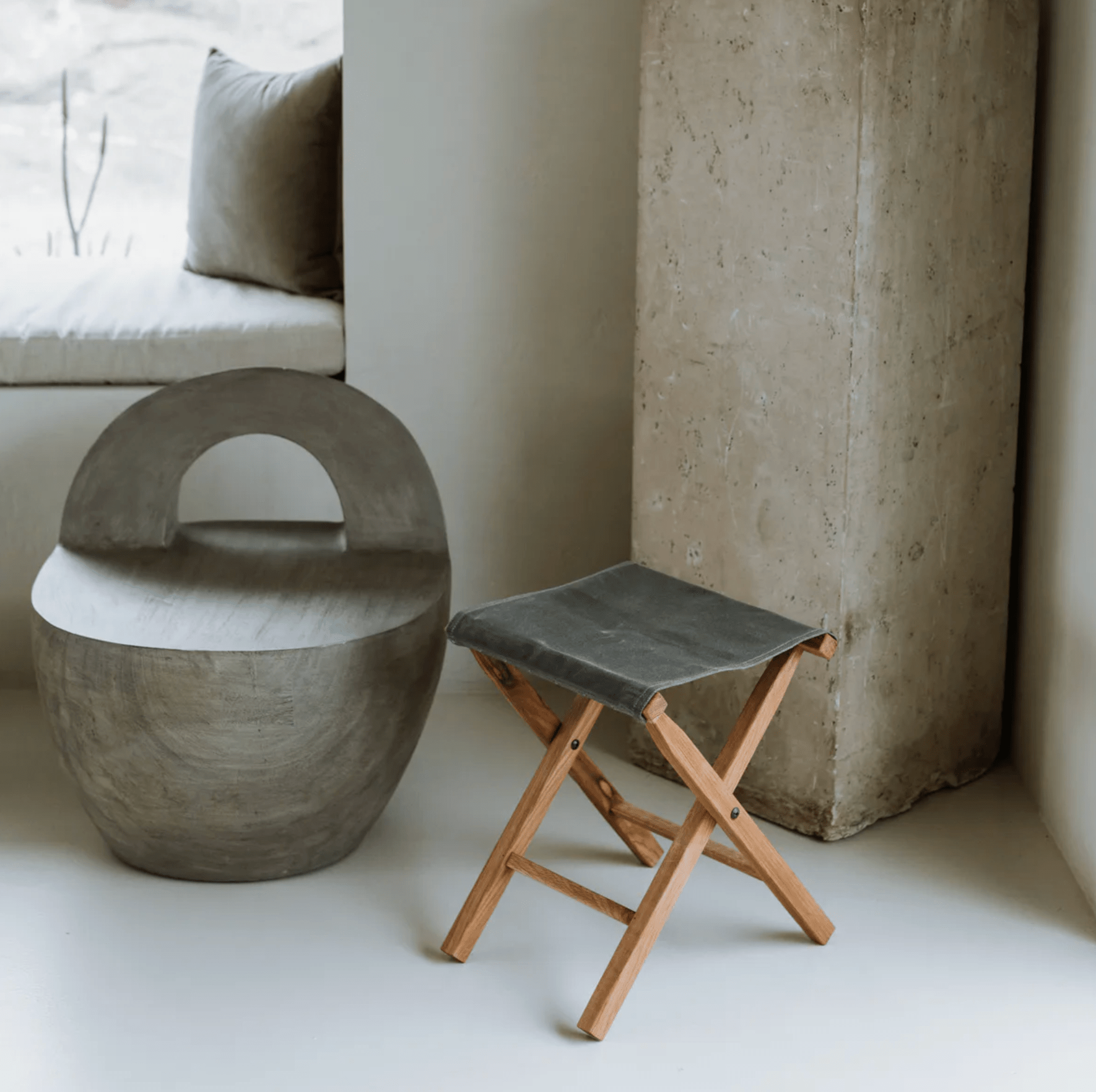 a camp stool and other furniture