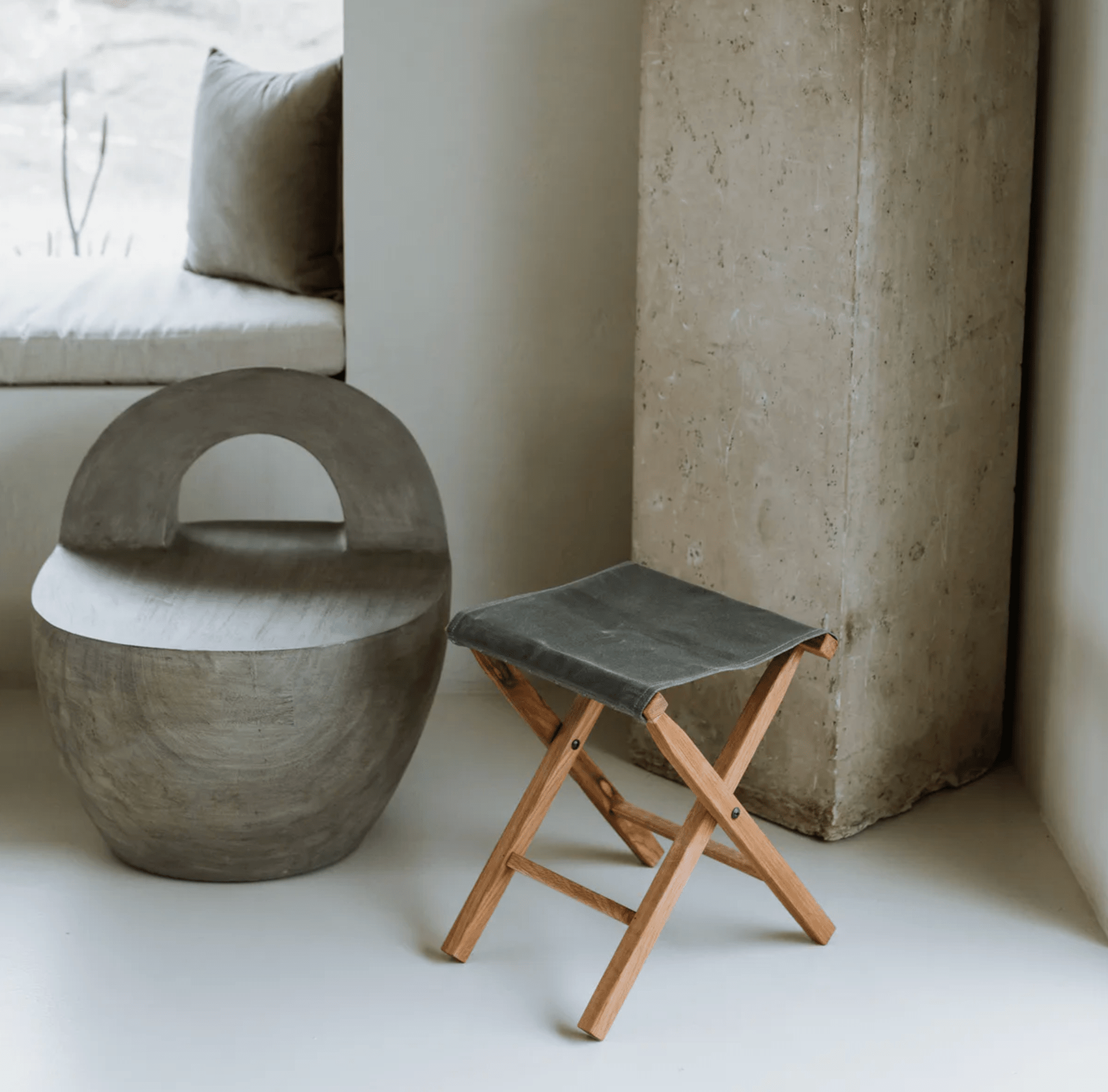a camp stool and other furniture