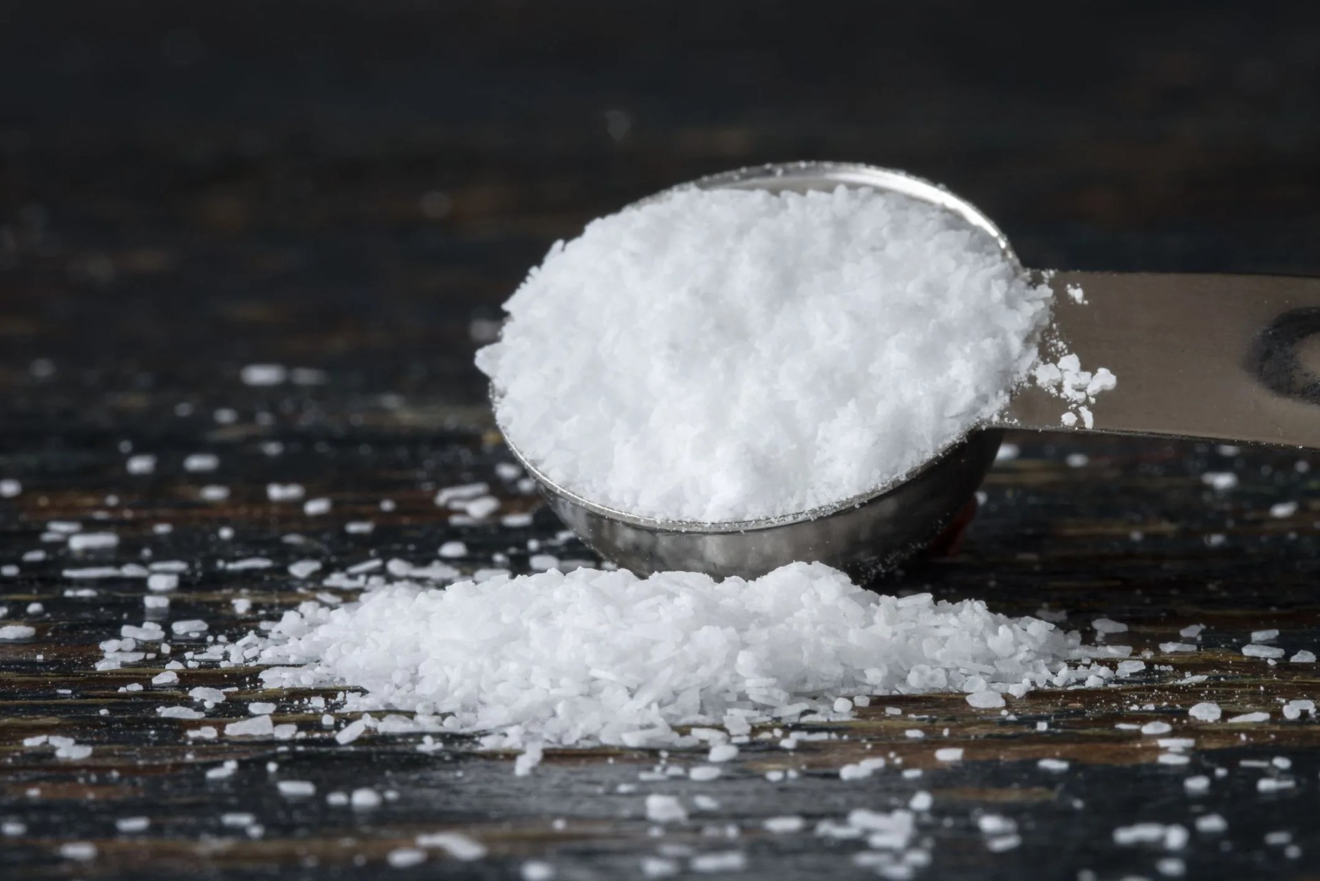 kosher salt spilled from a spice jar