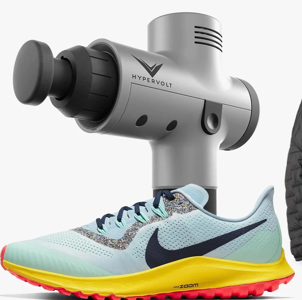 a massage gun, shoe, and jacket