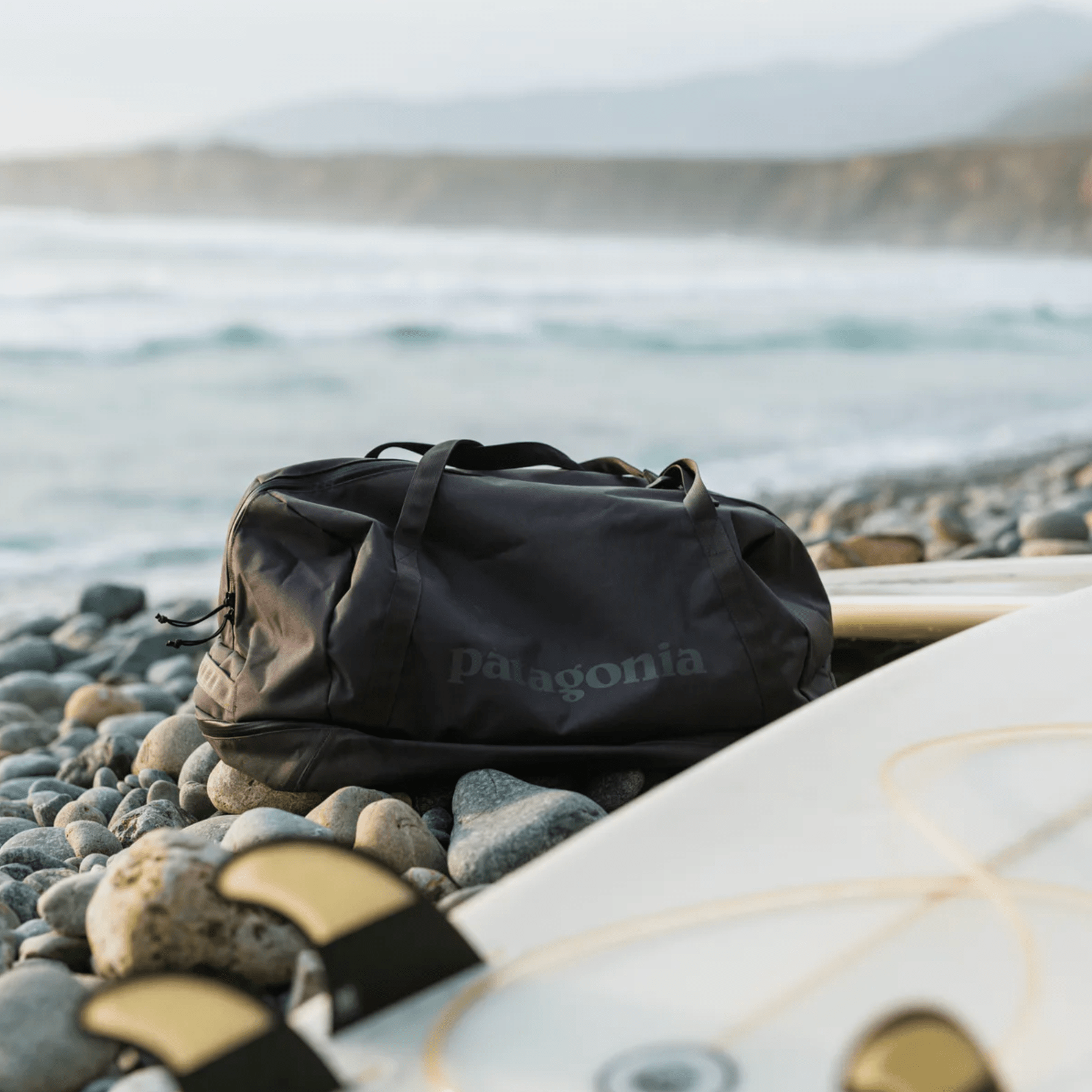 a duffel bag on a beach