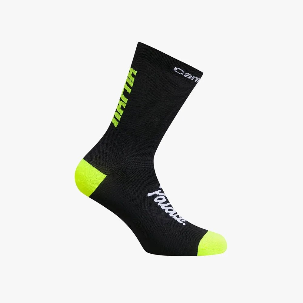a black sock with yellow toe and heel