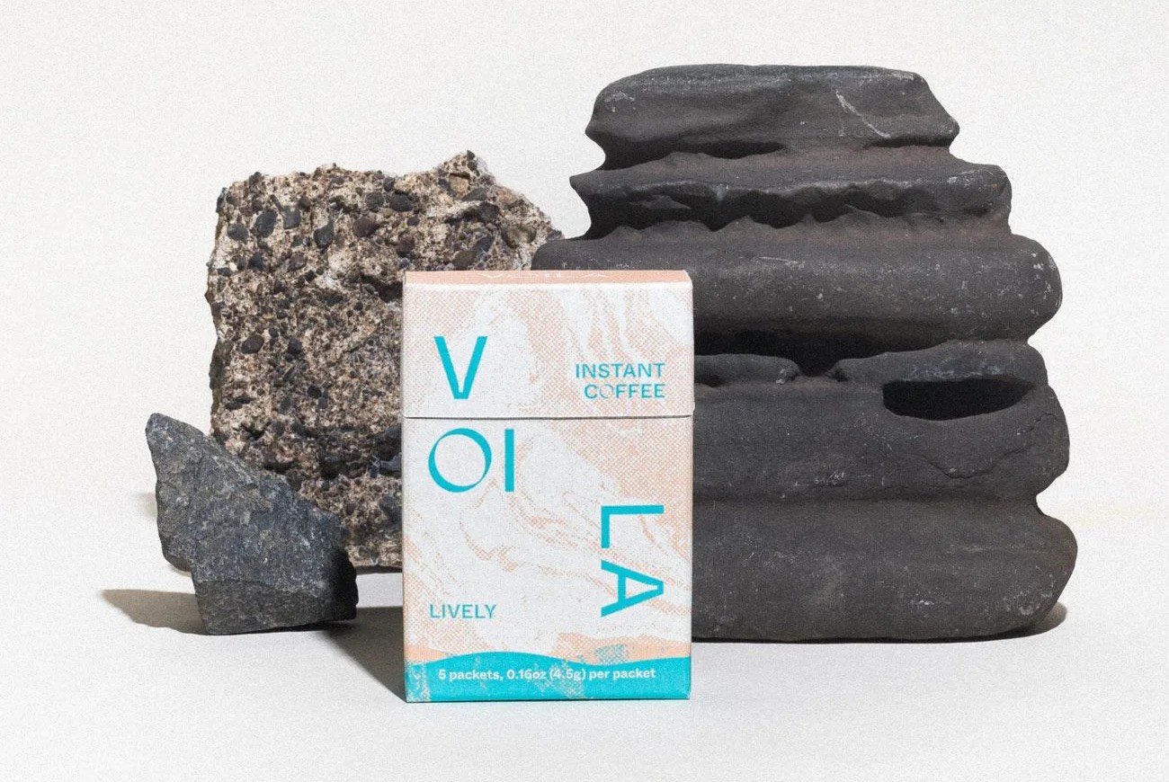 camping instant coffee next to rocks