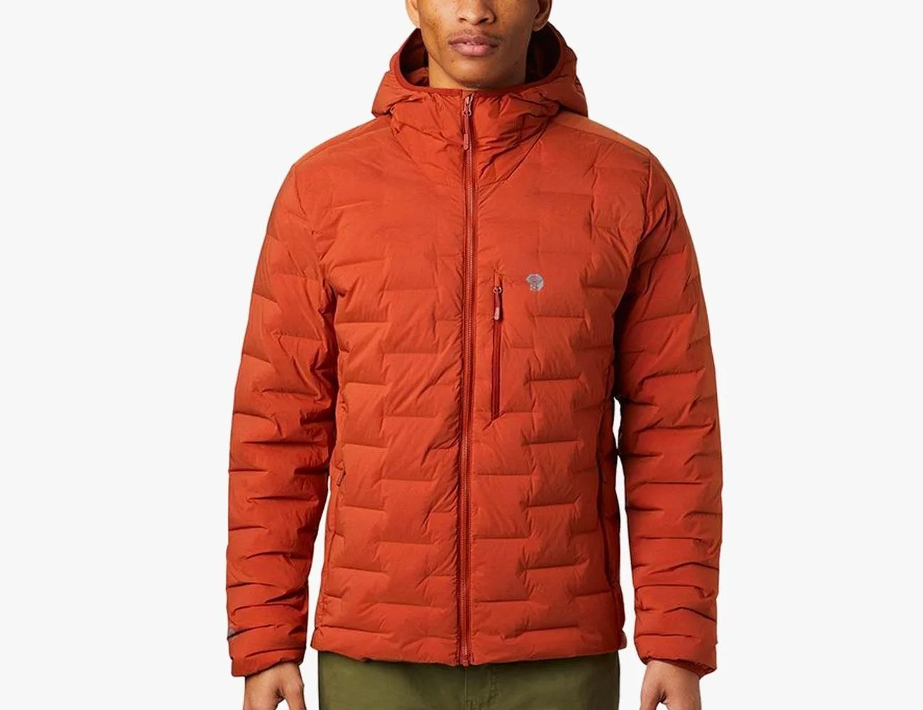 a man wearing an orange down jacket