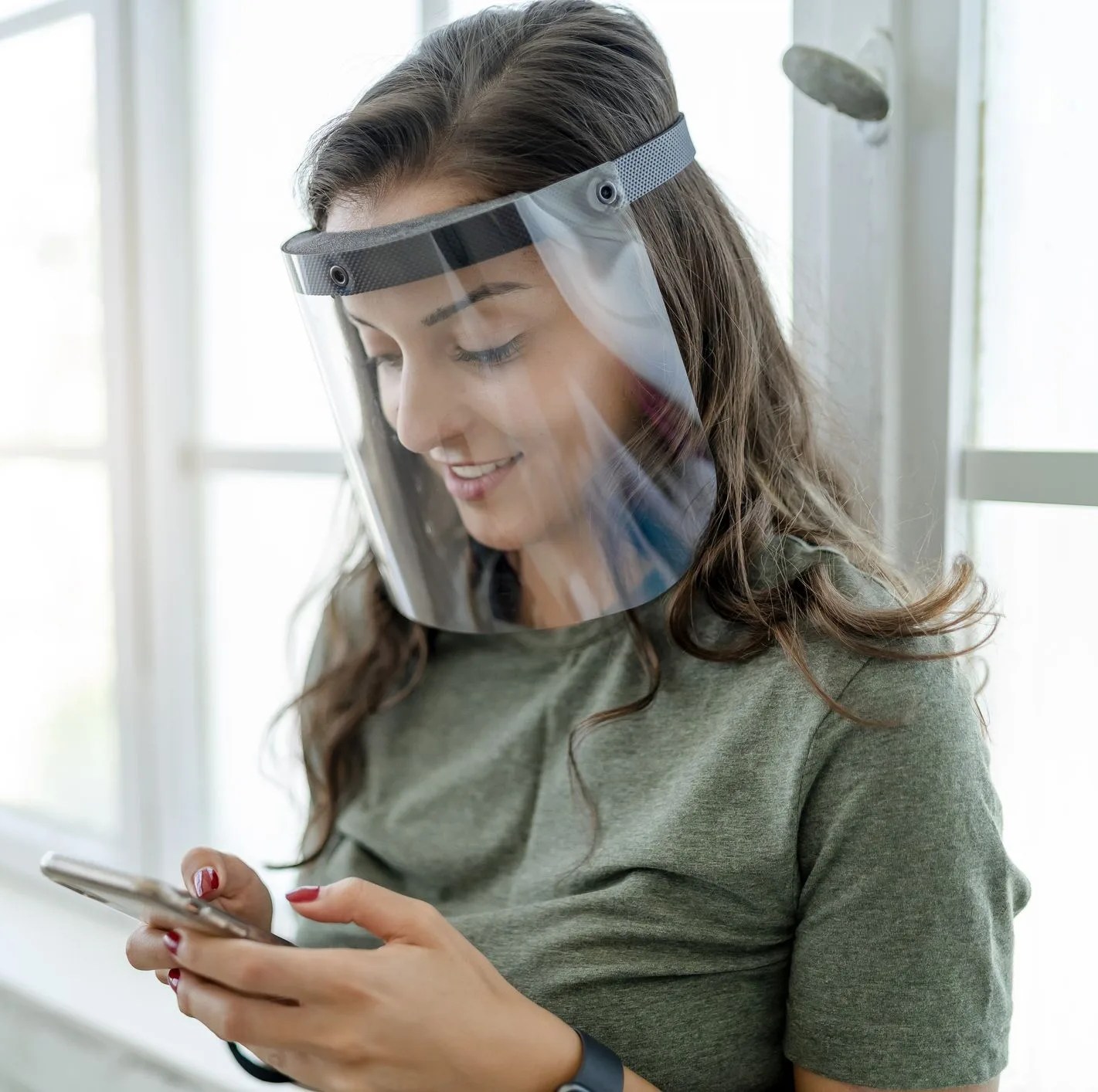 women wear mask and face shield to protect themselves