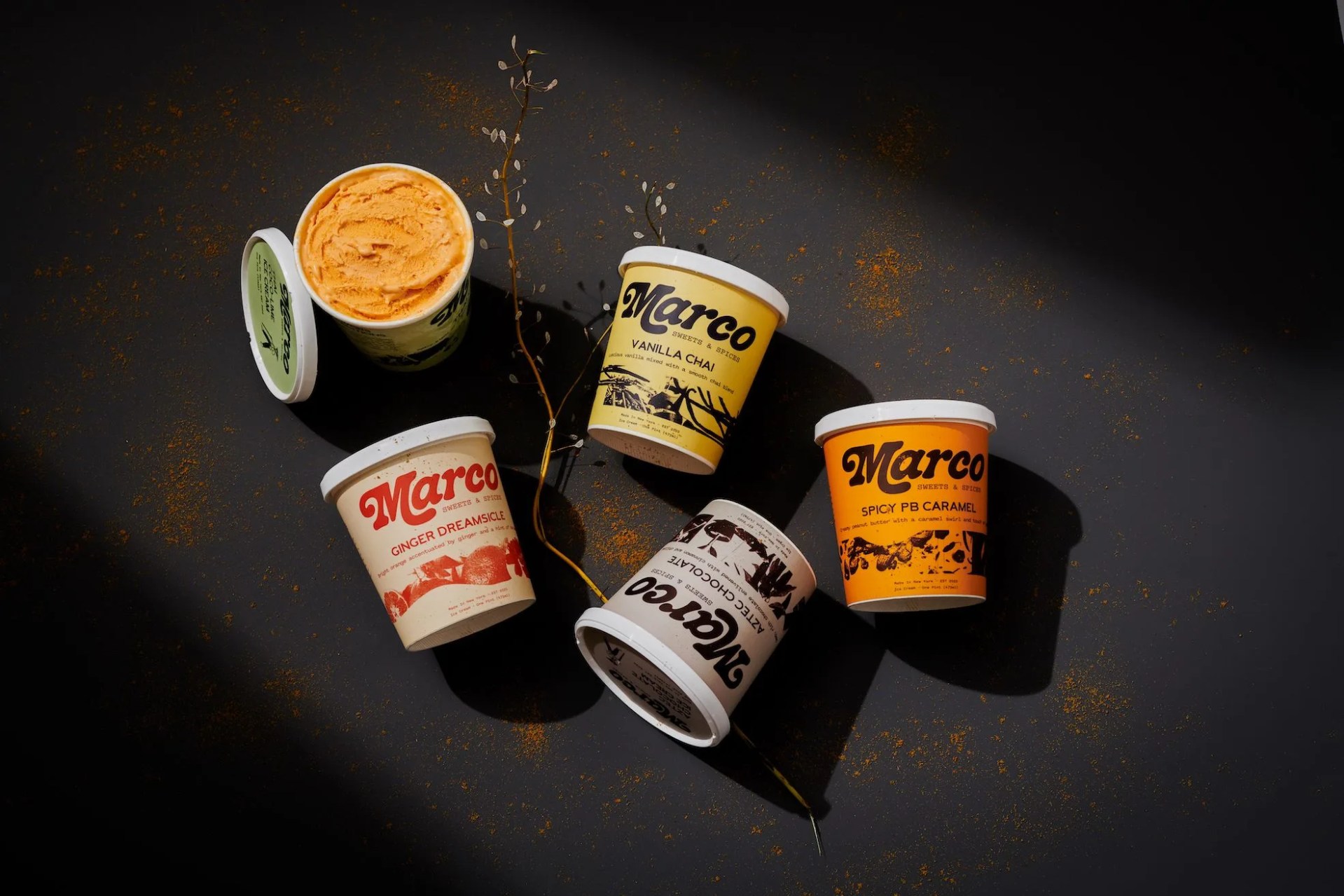 four unopened pints of ice cream and one opened pint