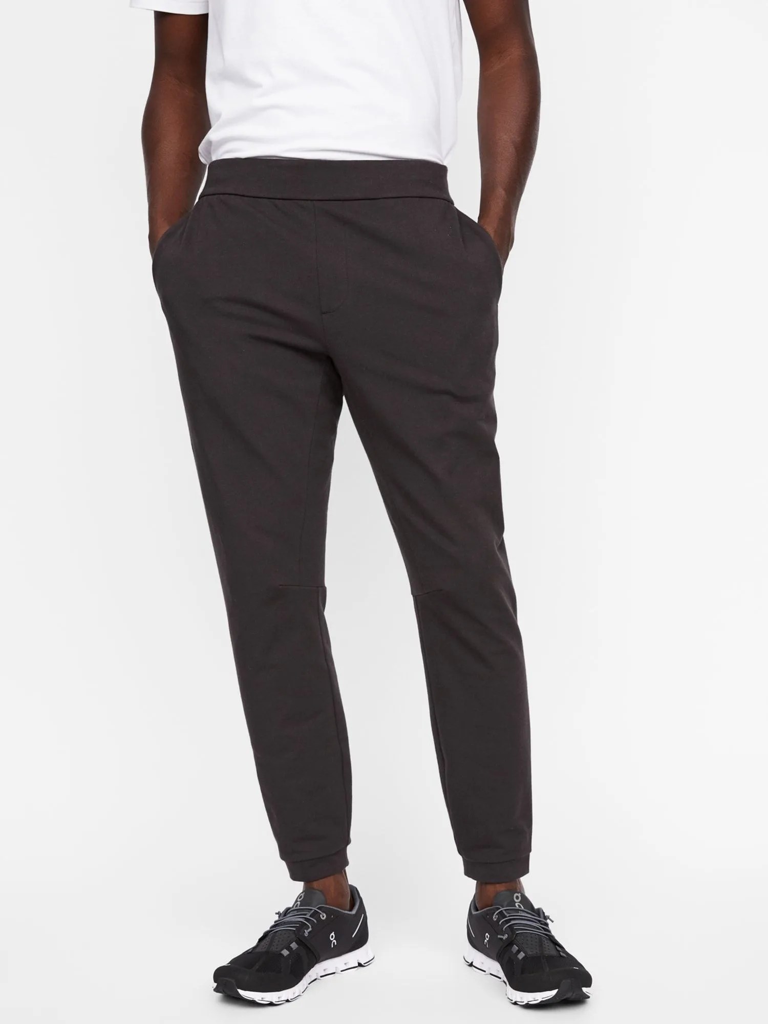 A model wearing a pair of joggers