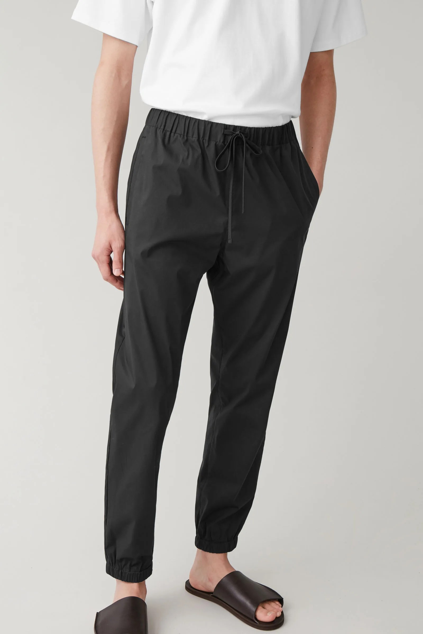 A model wearing elastic pants