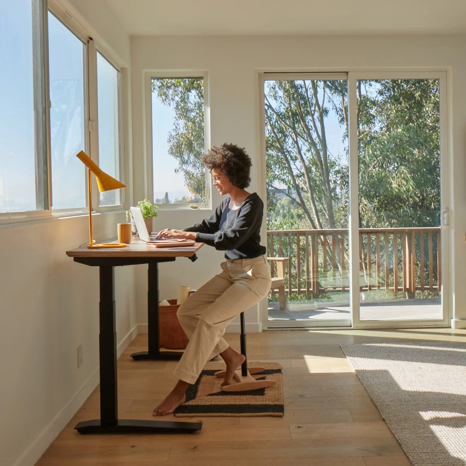 woman using standing desk
