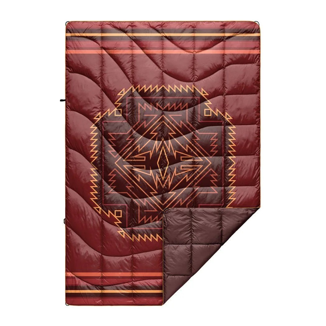 a puffy blanket with a red print