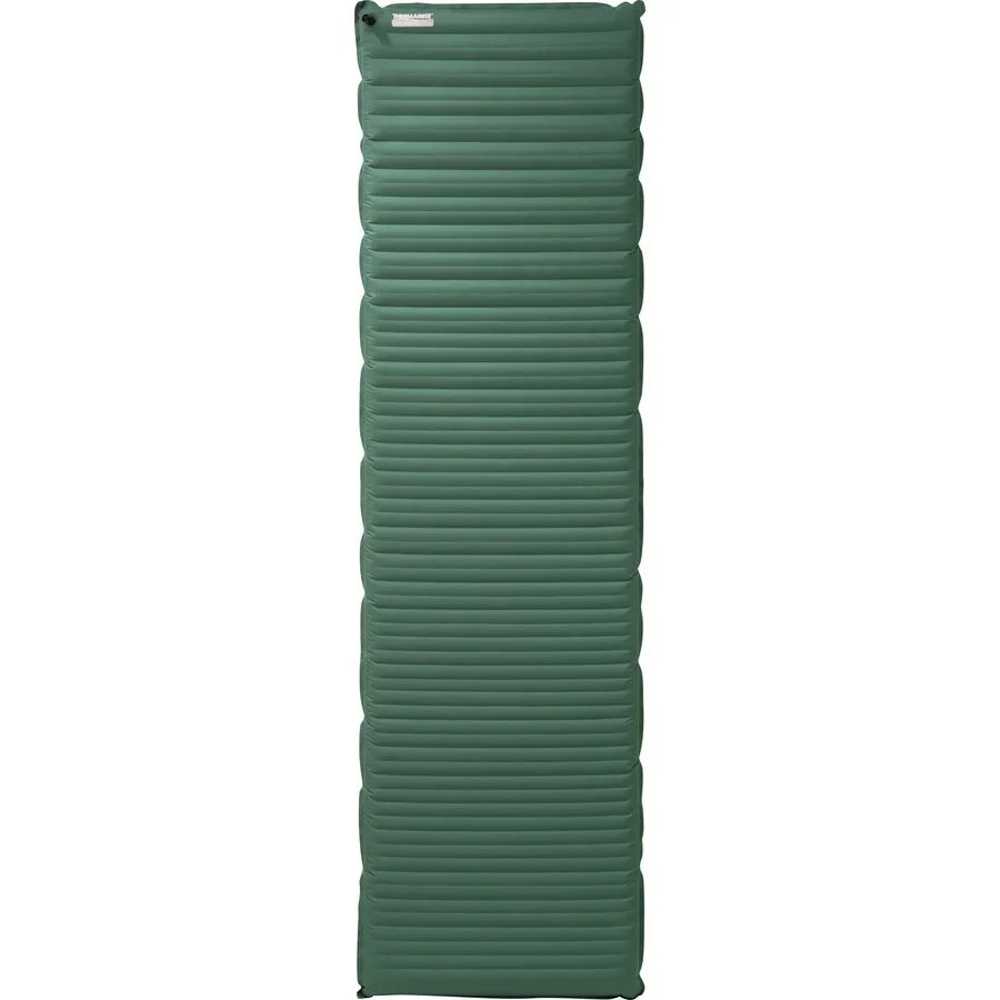 a green inflatable camping mattress