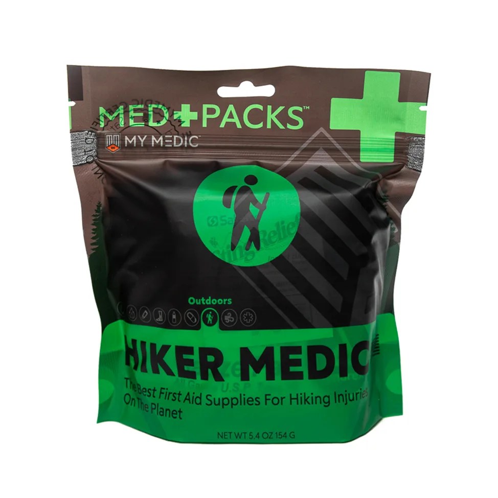 a green and black med pack for hiking