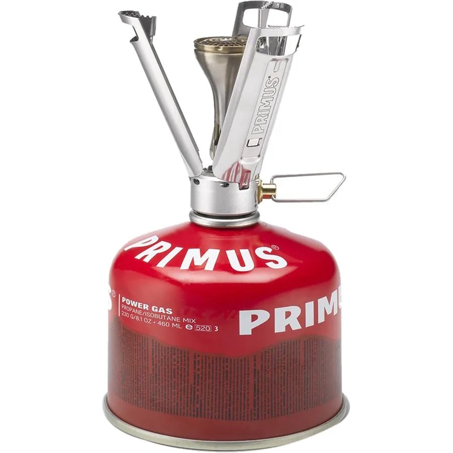 a small camping stove on a fuel canister