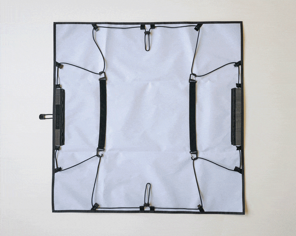 a flat bag that folds up with clothes
