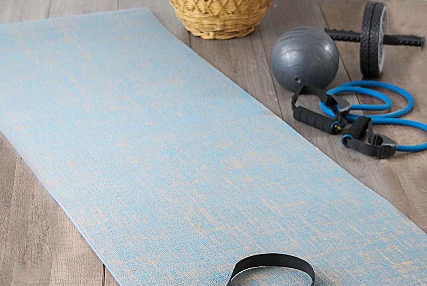 a yoga mat on a wooden floor