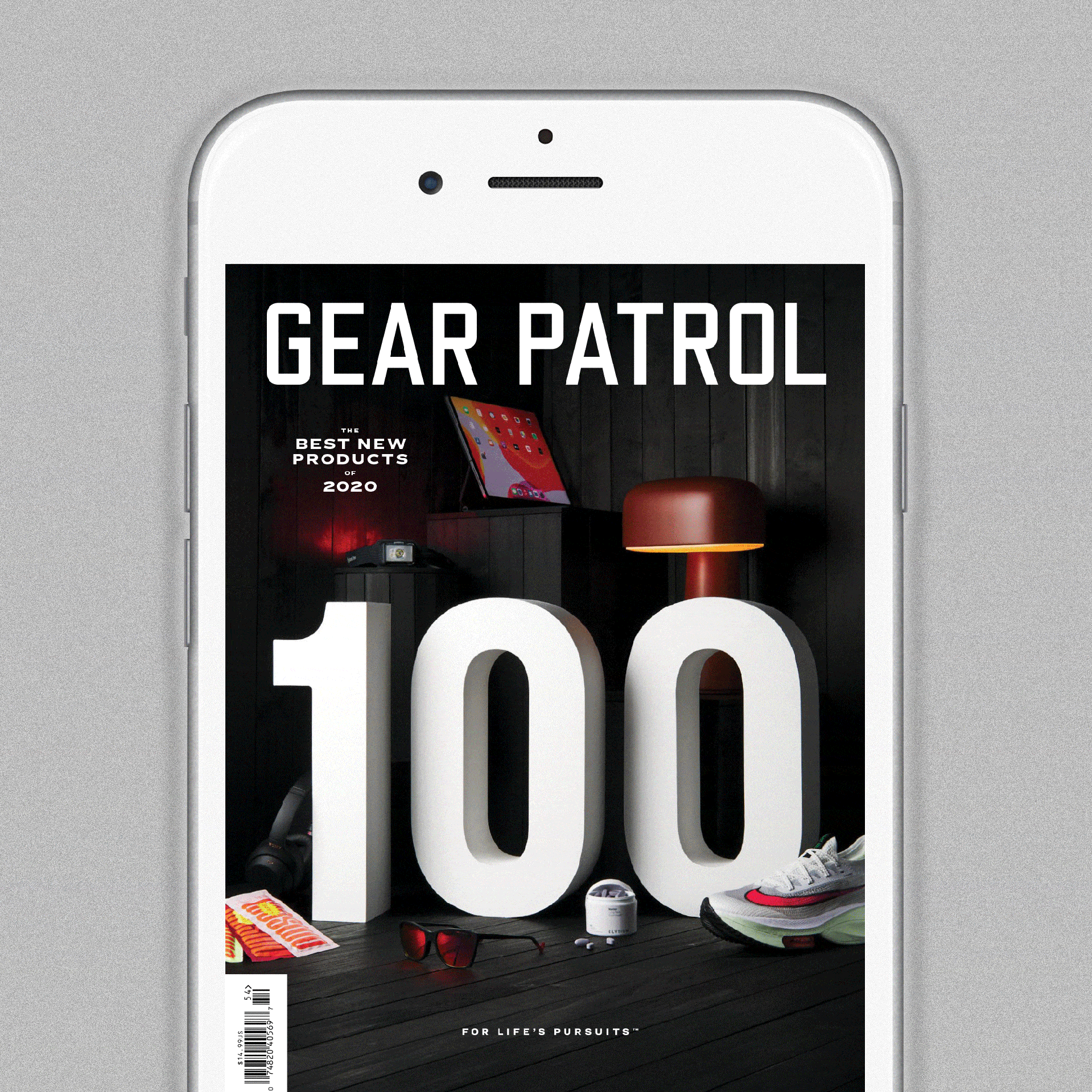 various pages from gear patrol magazine showing up on an iphone screen