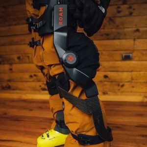 a skier wearing a robotic exoskeleton on his legs