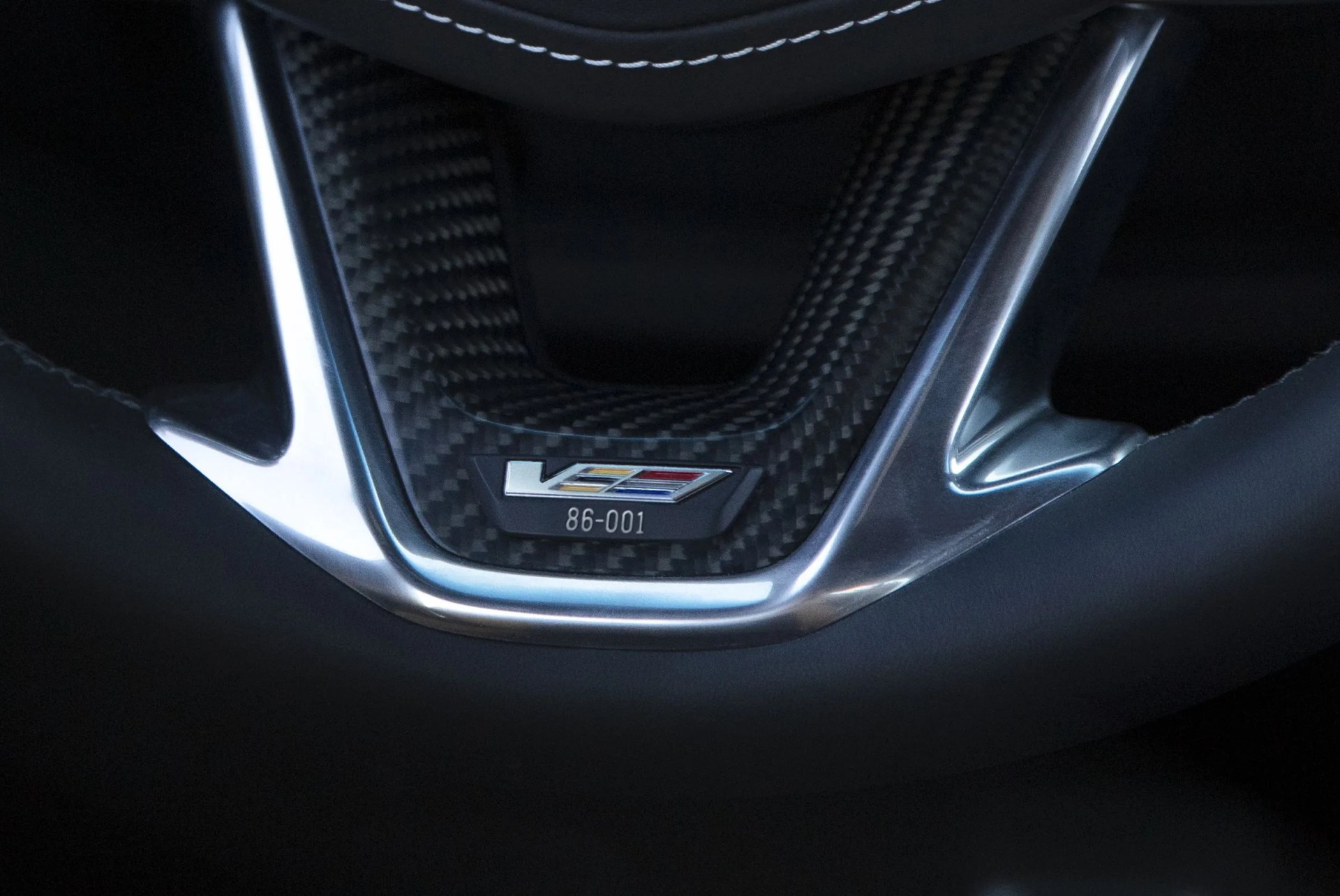 the available high performance steering wheel will come with a serialized v series plate the five digit sequence on the plate represents the model 8  ct5 v blackwing, the transmission 6  manual transmission and the number vehicle built 001  first vehicle built
