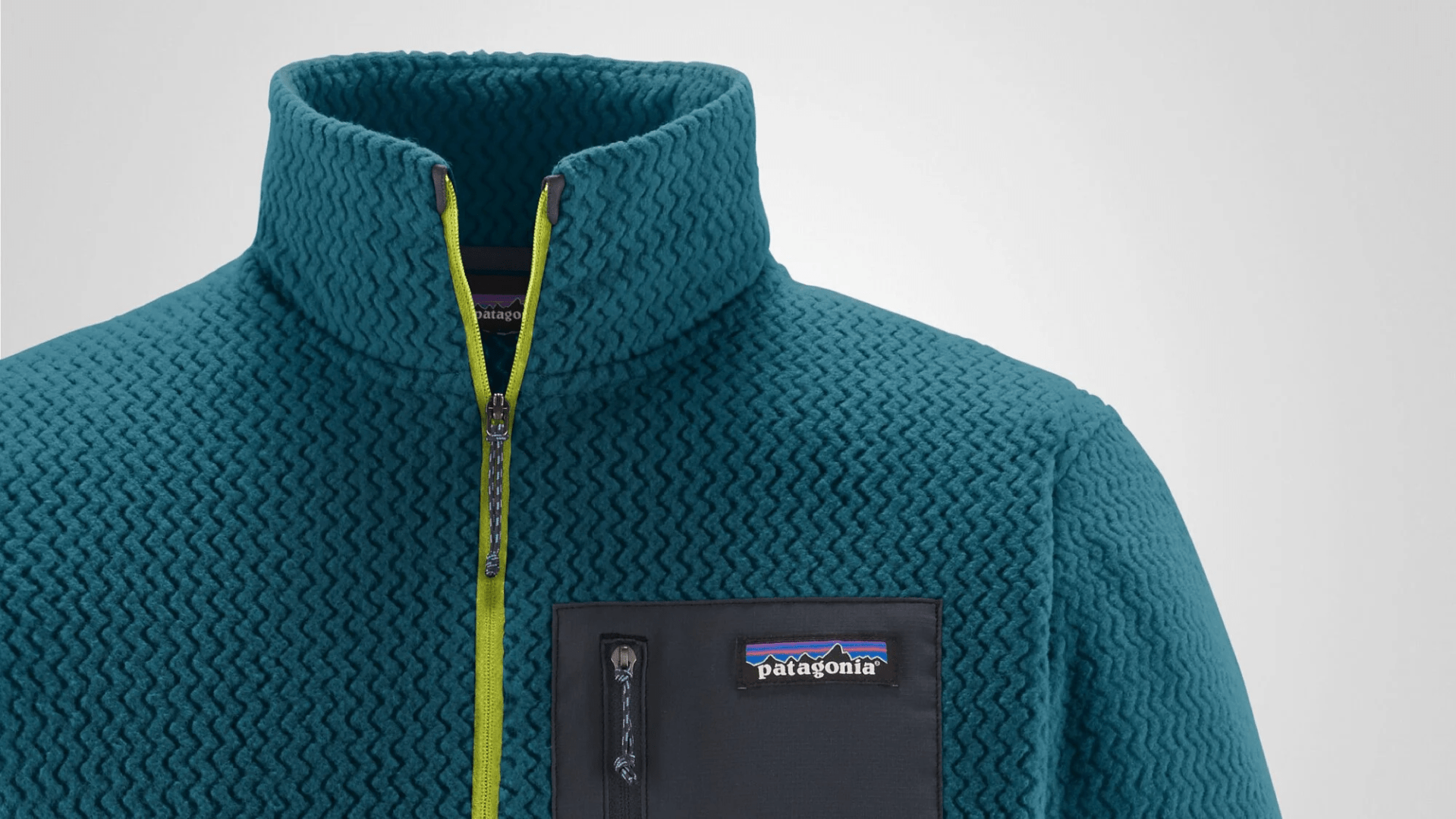 a teal patagonia technical fleece