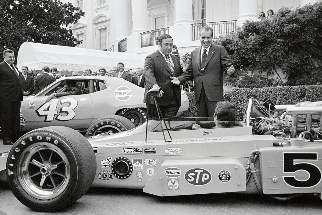 richard nixon covering his ear from load engine roar