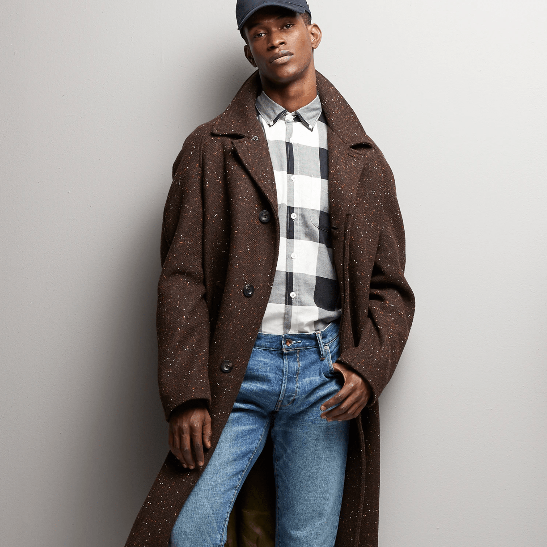 a model wearing a top coat