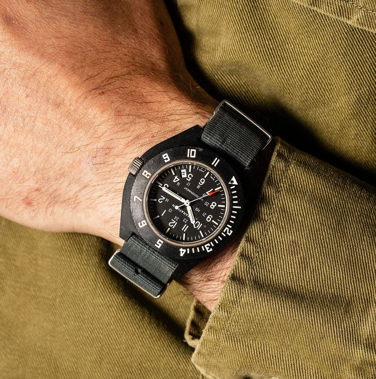 2 military watches in the field gear patrol ambiance 1
