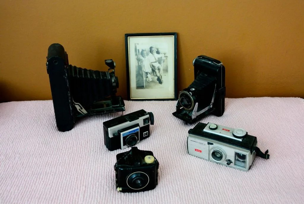 several antique film cameras