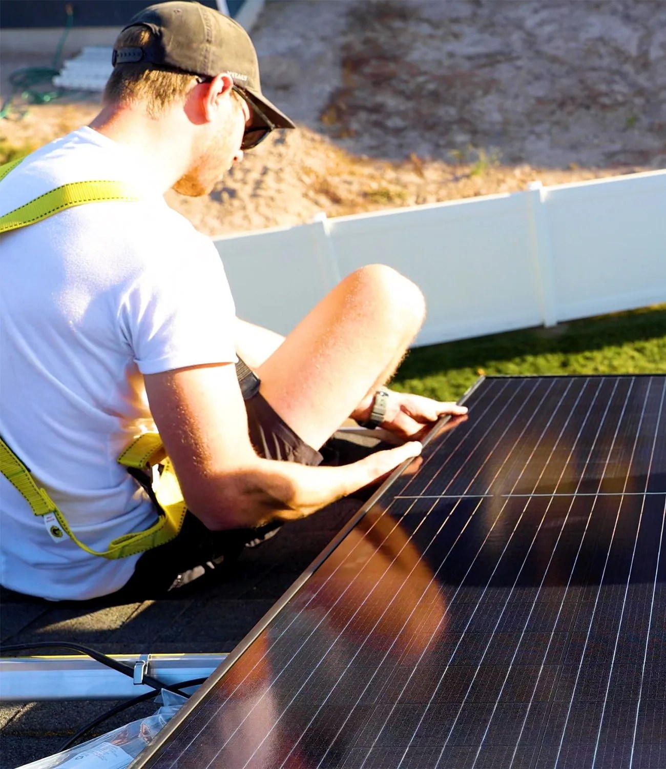 project solar worker installing solar panels