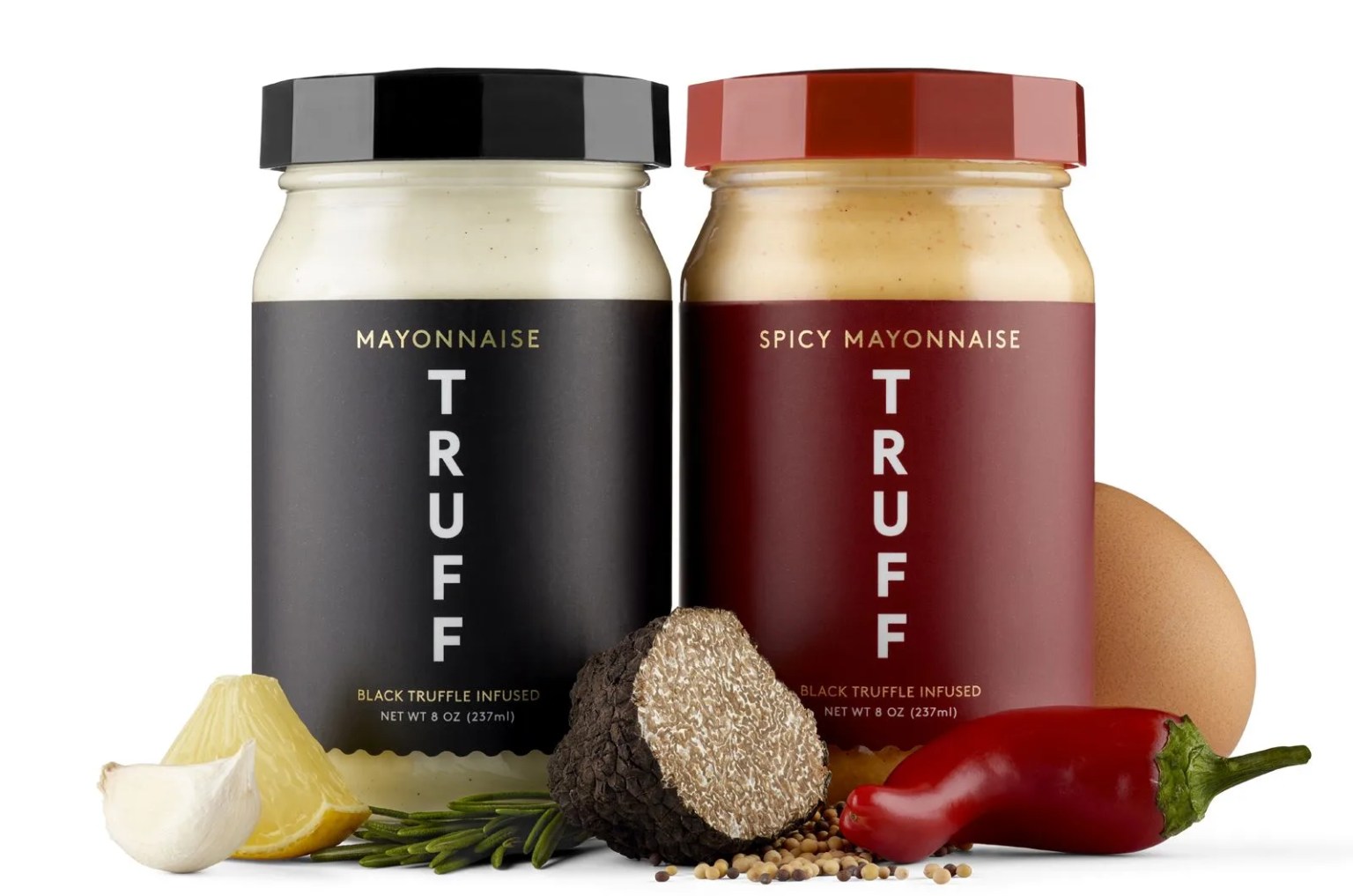 jar of mayo next to jar of spicy mayo surrounded by ingredients