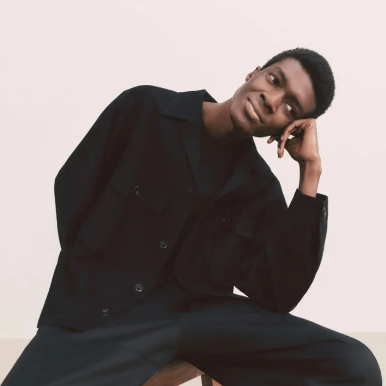 a model wearing a chore coat