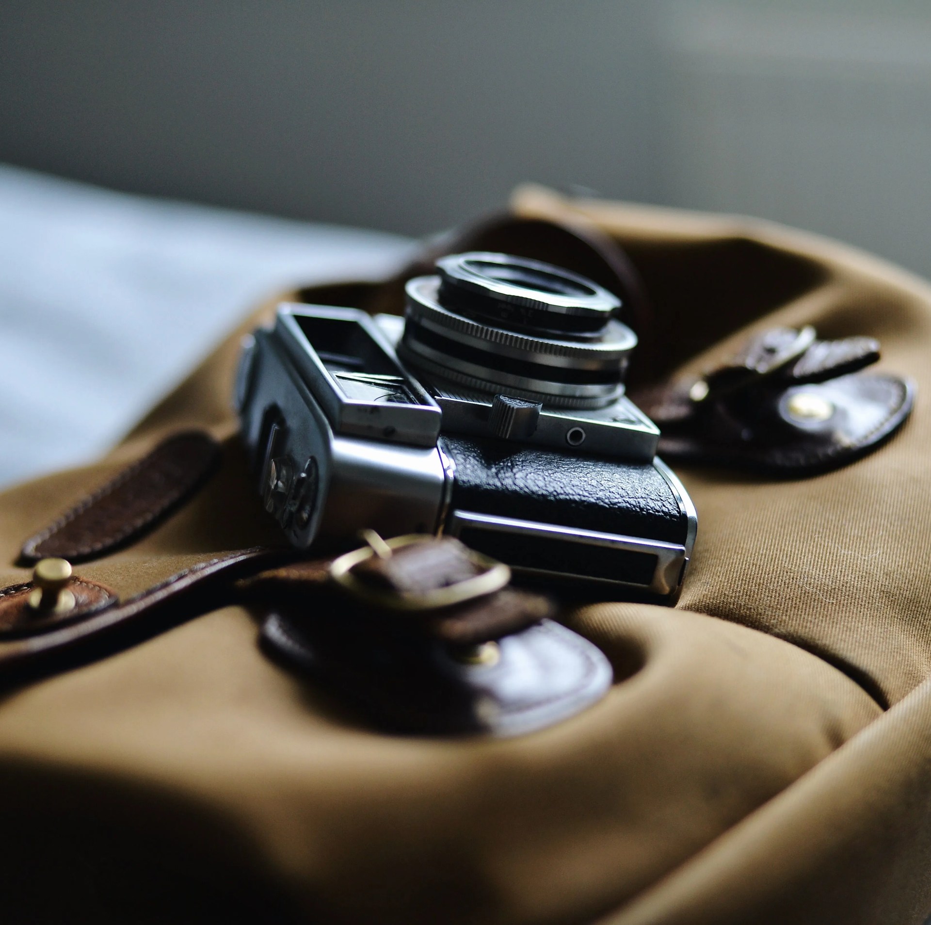vintage film camera and bag