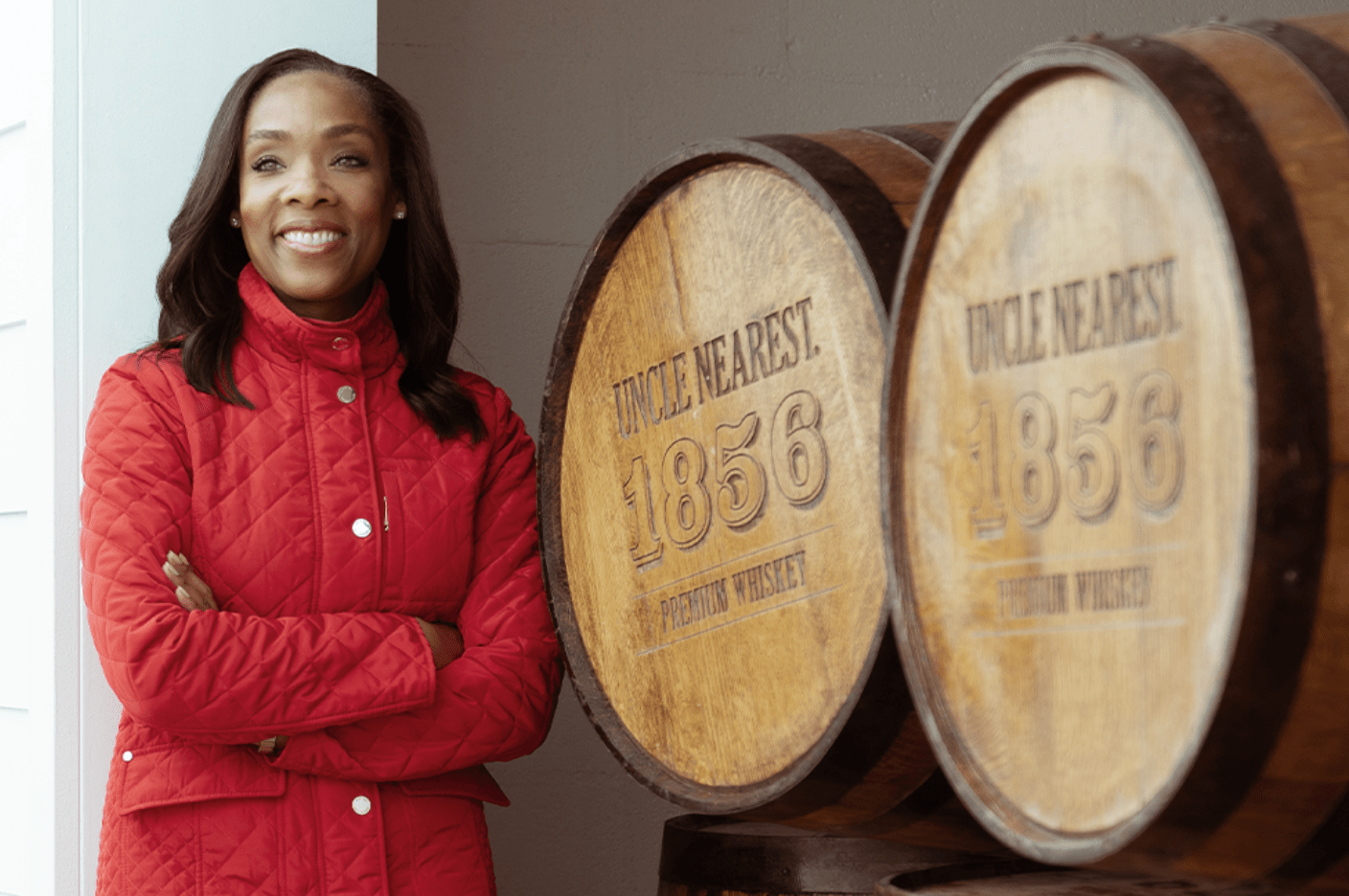 fawn weaver next to whiskey barrels