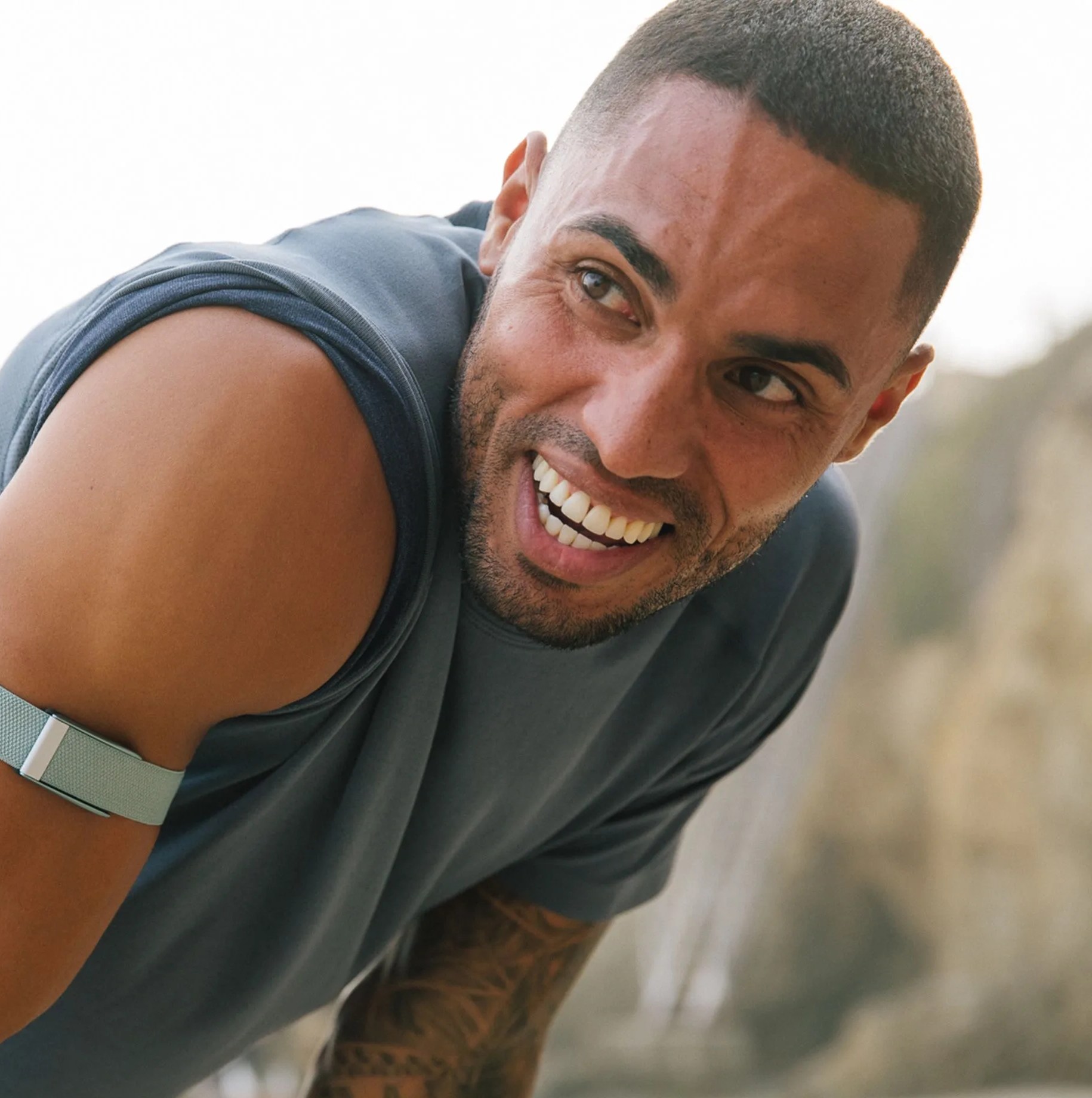 man wearing whoop band during run